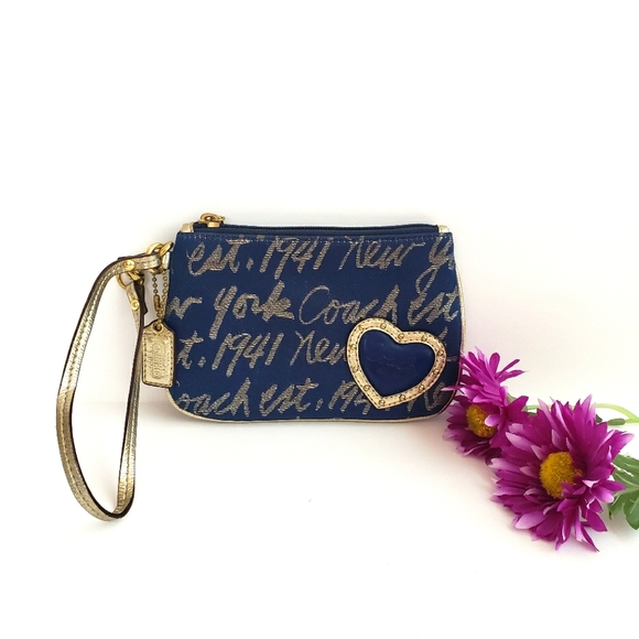 Coach Handbags - Coach navy blue metallic gold wristlet with gold lined heart 1941 New York